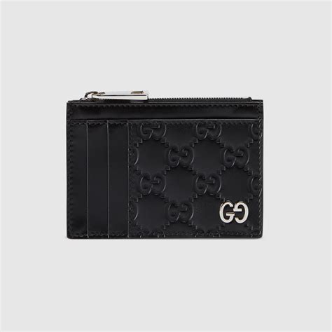 black gucci signature card case.